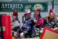 Clown and shriners in a parade