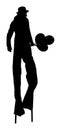 Clown on stilts with balloons vector silhouette. Juggler artist animator vector. Clown in circus.