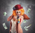 Clown thief steals money Royalty Free Stock Photo