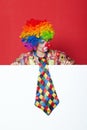 Clown with tie on blank white board Royalty Free Stock Photo