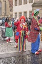 Clown among witches at Carnival parade, Stuttgart