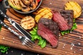 Club Beef steak with pepper sauce and Grilled vegetables on cutting board Royalty Free Stock Photo