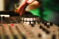 Club DJ playing mixing music on vinyl turntable Royalty Free Stock Photo