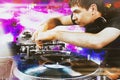 Club DJ playing mixing music on vinyl turntable Royalty Free Stock Photo