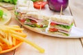 Club Sandwich with Cheese, Pickled Cucumber, Tomato and ham. Gar Royalty Free Stock Photo