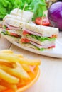 Club Sandwich with Cheese, Pickled Cucumber, Tomato and ham. Gar Royalty Free Stock Photo