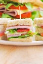 Club Sandwich with Cheese, Pickled Cucumber, Tomato and ham. Gar Royalty Free Stock Photo