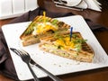 Club sandwich with egg, cucumber, tomato, ham Royalty Free Stock Photo