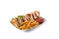 Club sandwich and French fries Royalty Free Stock Photo