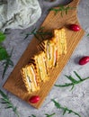 Club sandwich with ham, cheese, tomato and salad. Grilled sandwich with dried tomatoes bread Royalty Free Stock Photo