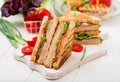 Club sandwich - panini with ham, cheese, tomato Royalty Free Stock Photo