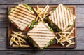 Club sandwich with tomatoes , cucumber , ham and cheese Royalty Free Stock Photo