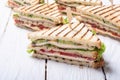 Club sandwich with tomatoes , cucumber , ham and cheese Royalty Free Stock Photo