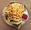 Club sandwiches and french fries Royalty Free Stock Photo