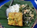 Cluban is a traditional Central Javanese food consisting of boiled vegetables with coconut sauce served on banana leaf