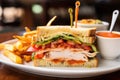 a clubhouse sandwich with plentiful sauces oozing out Royalty Free Stock Photo