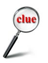 Clue red word mystery concept with magnifying glass Royalty Free Stock Photo