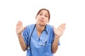 Clueless female medical nurse or doctor making dont know gesture Royalty Free Stock Photo