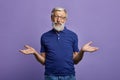 Clueless old man shrugging his shoulders Royalty Free Stock Photo