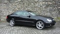 Cluj Napoca/Romania-April 7, 2017: Mercedes Benz W209 Coupe - year 2005, Elegance equipment, Black metallic, 19 inch alloy wheels Royalty Free Stock Photo