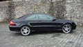 Cluj Napoca/Romania-April 7, 2017: Mercedes Benz W209 Coupe - year 2005, Elegance equipment, Black metallic, 19 inch alloy wheels Royalty Free Stock Photo