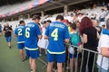 Fottball player signing autographs