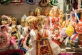 CLUJ-NAPOCA, ROMANIA - NOVEMBER 23, 2018: Traditional dolls at the Christmas market in the Unirii Square, Transylvania, Romania
