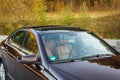 German luxurious sedan car - xxl sunroof, red/brown leather interior, chromed ornaments, expensive custom made individual car