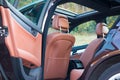German luxurious sedan car - xxl sunroof, red/brown leather interior, chromed ornaments, expensive custom made individual car