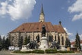 The famous Mathias Rex statue and The St. Michael`s Church on August 21, 2018 in Cluj-Napoca.