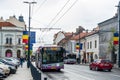 CLUJ-NAPOKA, ROMANIA - April 27, 2022. Trolleybus Solaris Trollino 18 #323 riding with passengers in the streets of Cluj-Napoka.