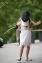 Girls fencing and practicing with sword