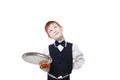 Clumsy inattentive little waiter drops pizza piece from tray Royalty Free Stock Photo
