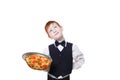 Clumsy inattentive little waiter drops pizza from tray Royalty Free Stock Photo