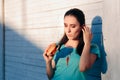 Clumsy Woman Staining Her Shirt with Ketchup Sauce Royalty Free Stock Photo