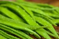 Cluster Bean or  GuarAlso Known as Gavar, Guwar or Guvar Bean isolated on Wooden Background Royalty Free Stock Photo