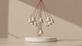 A Cluster of Ceramic Bells Suspended Above a White Pedestal Royalty Free Stock Photo