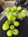 cluster of fresh greenish gold muscat grape.