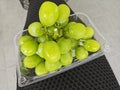 cluster of fresh greenish gold muscat grape.