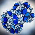 Shaped glass fragments, featuring a mix of deep blue and clear Royalty Free Stock Photo