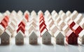 Cluster of Miniature White Houses with a Single Red One. Generative AI