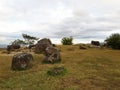 Cluster of rock hewn stone jars at the Plain of Jars, Phonsavan, Laos Dec 2015