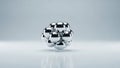 Cluster of shiny metallic spheres forming a geometric molecular structure on a light gray reflective surface Royalty Free Stock Photo