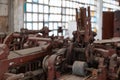 Cluster of vintage industrial machines, featuring their intricate mechanisms and complex details