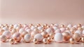 A cluster of white, pink and gold Easter eggs on a peach background Royalty Free Stock Photo