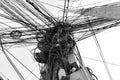 A cluster of wires and cables entangled on a pole, capturing the intricate and chaotic network of Asian power lines