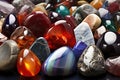 a clustered display of smooth, polished gemstones