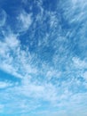 Clusters of high-altitude cirrus cumulus clouds in April Royalty Free Stock Photo