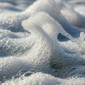 Clusters of sea foam bubbles create intricate, translucent formations with varying Royalty Free Stock Photo
