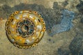 Clutch Cover expire on background gear transmission.expire on dirty background. Royalty Free Stock Photo